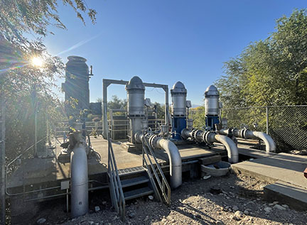 "four irrigation water pumps alongside the Okanogan River"